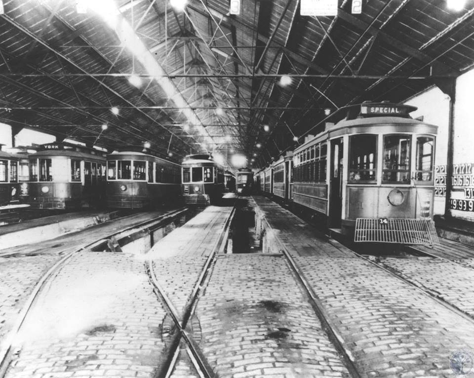 Historic Newport streetcars inside the car barn